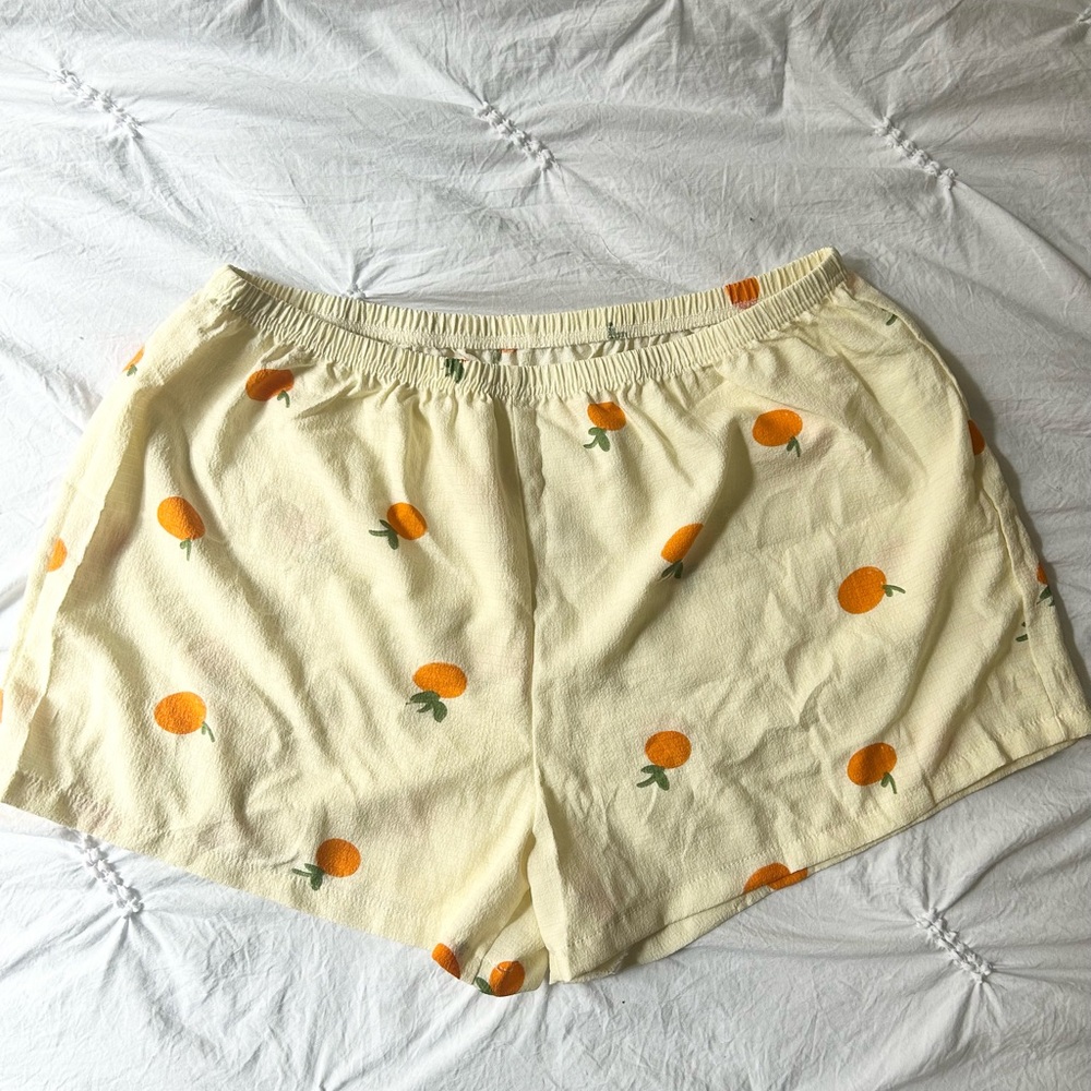 Cream Shorts with Orange Print
